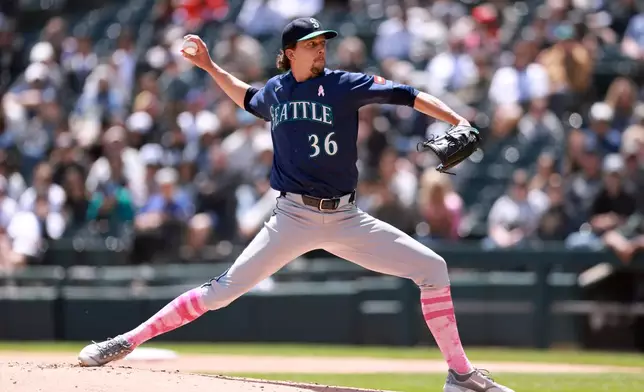 Seattle Mariners pitcher Logan Gilbert throws during the first inning of a baseball game against the Chicago White Sox, Sunday, May 10, 2026, in Chicago. (AP Photo/Geoff Stellfox)