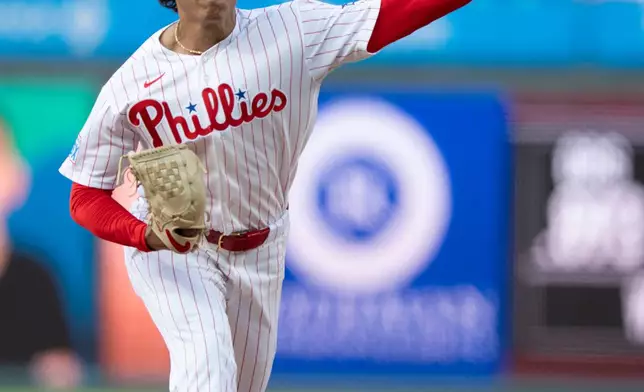 Philadelphia Phillies starting pitcher Jesus Luzardo delivers during the first inning of a baseball game against the Cincinnati Reds, Tuesday, May 19, 2026, in Philadelphia. (AP Photo/Chris Szagola)