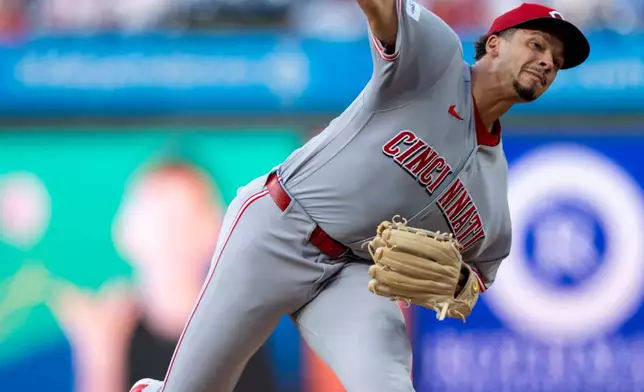 Cincinnati Reds pitcher Chase Burns delivers during the first inning of a baseball game against the Philadelphia Phillies, Tuesday, May 19, 2026, in Philadelphia. (AP Photo/Chris Szagola)