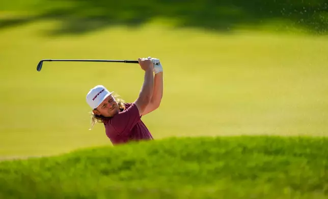 Cameron Smith, of Australia, hits from the 18th fairway during the final round of the PGA Championship golf tournament at Aronimink Golf Club, Sunday, May 17, 2026, in Newtown Square, PA. (AP Photo/Matt Slocum)