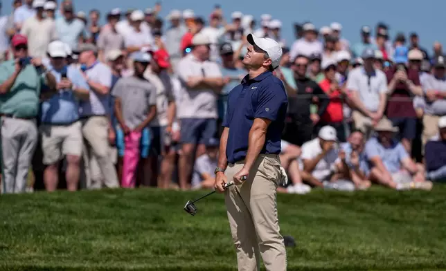 Rory McIlroy, of Northern Ireland, reacts to a missed putt on the seventh green during the final round of the PGA Championship golf tournament at Aronimink Golf Club, Sunday, May 17, 2026, in Newtown Square, PA. (AP Photo/Matt Slocum)