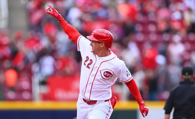 Cincinnati Reds' JJ Bleday (22) reacts after hitting a three-run home run during the fifth inning of a baseball game against the Washington Nationals in Cincinnati, Thursday, May 14, 2026. (AP Photo/Ben Jackson)