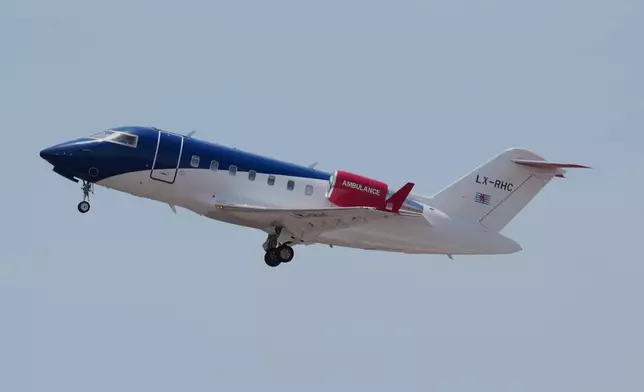 An air ambulance takes off with evacuated patients from the MV Hondius cruise ship from the airport in Praia, Cape Verde, Wednesday, May 6, 2026. (AP Photo/Misper Apawu)