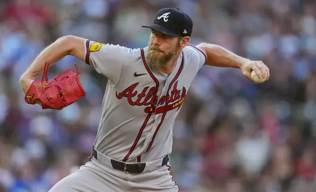 Atlanta Braves starting pitcher Chris Sale works against the Colorado Rockies in the first inning of a baseball game, Saturday, May 2, 2026, in Denver. (AP Photo/David Zalubowski)