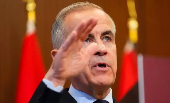 Prime Minister Mark Carney makes an announcement on Parliament Hill in Ottawa on Thursday, May 14, 2026. (Sean Kilpatrick/The Canadian Press via AP)