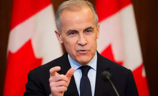 Prime Minister Mark Carney makes an announcement on Parliament Hill in Ottawa on Thursday, May 14, 2026. (Sean Kilpatrick/The Canadian Press via AP)