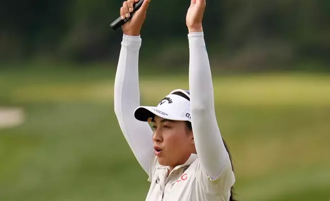 Jeeno Thitikul, of Thailand, reacts after making a birdie putt on the 18th hole to win the Mizuho Americas Open golf tournament, Sunday, May 10, 2026, in West Caldwell, N.J. (AP Photo/Seth Wenig)