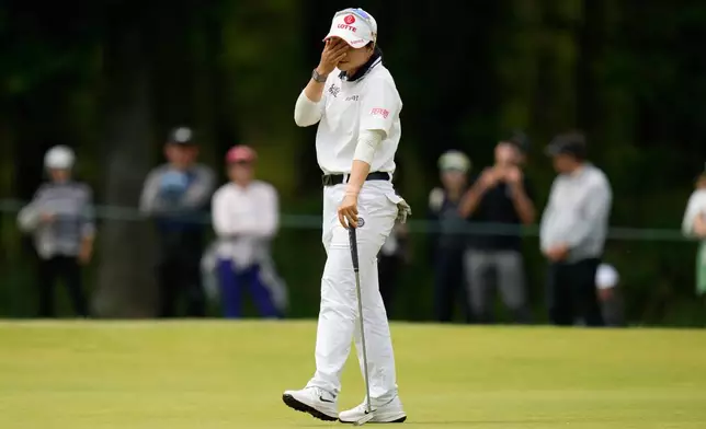 Hye-jin Choi, of South Korea, reacts after missing a putt on the 16th hole after the final round of the Mizuho Americas Open golf tournament, Sunday, May 10, 2026, in West Caldwell, N.J. (AP Photo/Seth Wenig)