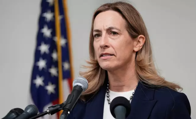FILE - New Jersey Governor-elect Mikie Sherrill talks to reporters during a news conference, in Trenton, N.J., Nov. 5, 2025. (AP Photo/Seth Wenig, File)