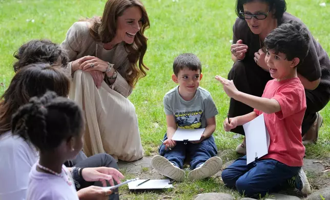 Britain's Kate, Princess of Wales visits the Salvador Allende preschool to observe how nature-based learning is embedded within the Reggio Emilia approach, part of a two-day trip, in Reggio Emilia, Italy, Thursday, May 14, 2026. (AP Photo/Antonio Calanni, Pool)