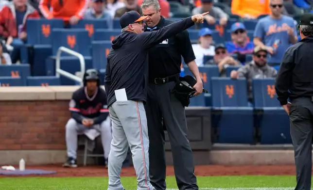Detroit Tigers manager A.J. Hinch argues with an umpire during the fourth inning of a baseball game against the New York Mets, Thursday, May 14, 2026, in New York. (AP Photo/Yuki Iwamura)