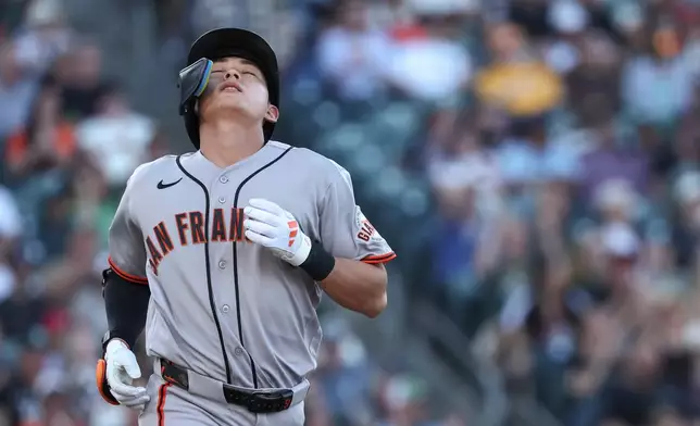 San Francisco Giants' Jung Hoo Lee reacts after hitting a line out during the first inning of a baseball game against the Athletics Saturday, May 16, 2026, in West Sacramento, Calif. (AP Photo/Sara Nevis)