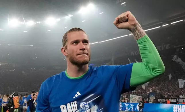 Schalke's goalkeeper Loris Karius celebrates at the end of the German Bundesliga 2 soccer match between FC Schalke 04 and Fortuna Duesseldorf in Gelsenkirchen, Germany, Saturday, May 2, 2026. (AP Photo/Martin Meissner)