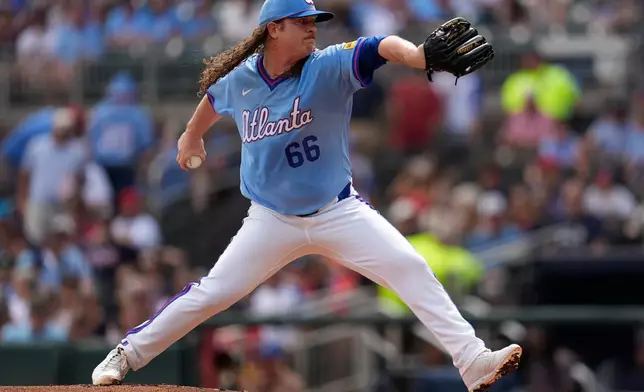 Atlanta Braves pitcher Grant Holmes works in the first inning of a baseball game against the Washington Nationals, Saturday, May 23, 2026, in Atlanta. (AP Photo/Mike Stewart)