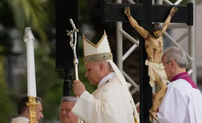 Pope Leo XIV celebrates Mass in front of the Pompeii Shrine during his pastoral visit in Pompeii, Italy, Friday, May 8, 2026. (AP Photo/Gregorio Borgia)