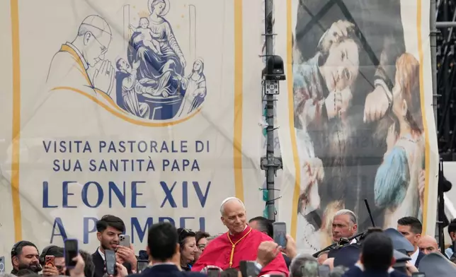Pope Leo XIV greets faithful during his pastoral visit in Pompeii, Italy, Friday, May 8, 2026. (AP Photo/Gregorio Borgia)