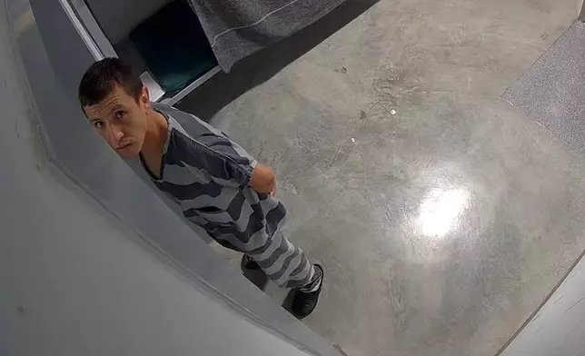 In this image from video provided by the Missouri State Highway Patrol, Immigration and Customs Enforcement detainee Brayan Rayo Garzon looks towards a surveillance camera in the Phelps County jail in Rolla, Mo., on April 7, 2025, shortly before he died by suicide. (Missouri State Highway Patrol via AP)