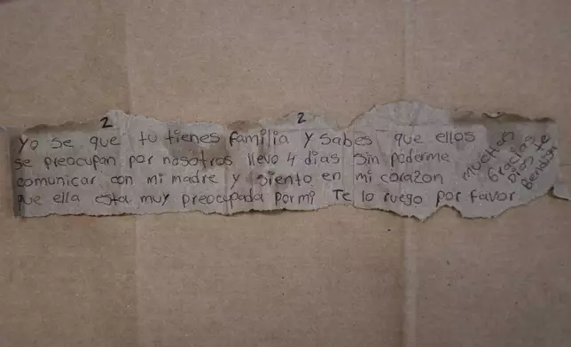 This photo provided by the Missouri State Highway Patrol shows a note written in Spanish by Immigration and Customs Enforcement detainee Brayan Rayo Garzon asking for a phone call with his mother, while he was in the Phelps County jail in Rolla, Mo., on April 7, 2025, shortly before he died by suicide. (Missouri State Highway Patrol via AP)