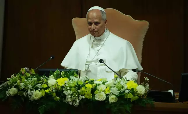 Pope Leo XIV attends the presentation of his first encyclical, "Magnifica humanitas: On Safeguarding the Human Person in the Time of Artificial Intelligence," at the Vatican, Monday, May 25, 2026. (AP Photo/Alessandra Tarantino)