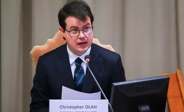 Anthropic co-founder Christopher Olah speaks during the presentation of Pope Leo XIV's first encyclical, "Magnifica humanitas: On Safeguarding the Human Person in the Time of Artificial Intelligence," at the Vatican, Monday, May 25, 2026. (AP Photo/Alessandra Tarantino)