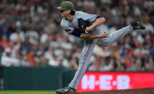 Texas Rangers pitcher Jacob deGrom delivers during the sixth inning of a baseball game against the Houston Astros, Saturday, May 16, 2026, in Houston. (AP Photo/Kevin M. Cox)