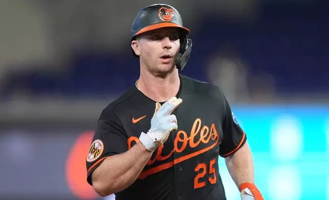 Baltimore Orioles' Pete Alonso celebrates as he runs the bases after hitting a three-run home run during the first inning of a baseball game against the Miami Marlins, Wednesday, May 6, 2026, in Miami. (AP Photo/Rebecca Blackwell)