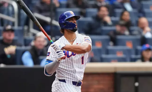 New York Mets' MJ Melendez (1) follows through on a three run home run during the third inning of a baseball game against the Washington Nationals Thursday, April 30, 2026, in New York. (AP Photo/Frank Franklin II)