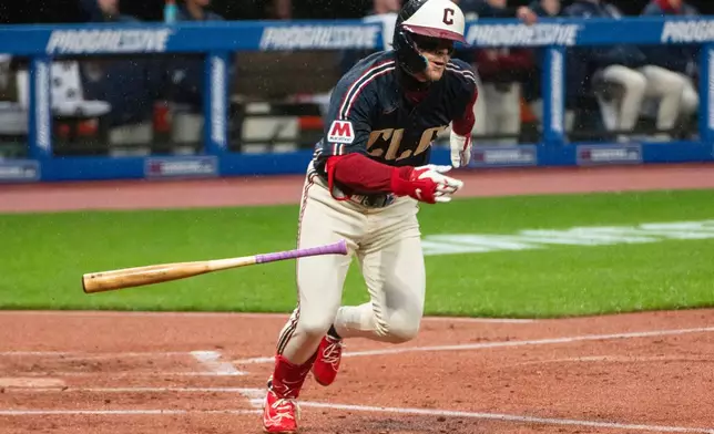 Cleveland Guardians' Travis Bazzana heads to first base after hitting his first major league home run off Minnesota Twins starting pitcher Connor Prielipp during the first inning of a baseball game, Friday, May 8, 2026, in Cleveland. (AP Photo/Phil Long)