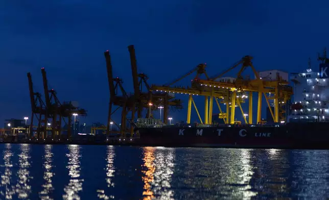 Night lights from Khlong Toei Pier shimmer on the Chao Phraya River in Bangkok, Thailand on Jan. 3, 2026. (AP Photo/Anton L. Delgado)