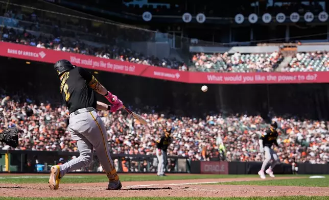 Pittsburgh Pirates' Spencer Horwitz (2) hits a two-run double during the 10th inning of a baseball game against the San Francisco Giants, Sunday, May 10, 2026, in San Francisco. (AP Photo/Godofredo A. Vásquez)