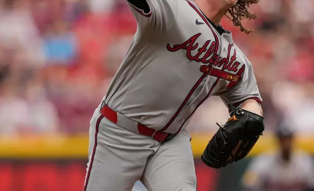 Atlanta Braves pitcher Grant Holmes throws during the first inning of a baseball game against the Cincinnati Reds in Cincinnati, Friday, May 29, 2026. (AP Photo/Carolyn Kaster)