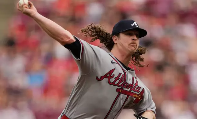 Atlanta Braves pitcher Grant Holmes throws during the first inning of a baseball game against the Cincinnati Reds in Cincinnati, Friday, May 29, 2026. (AP Photo/Carolyn Kaster)
