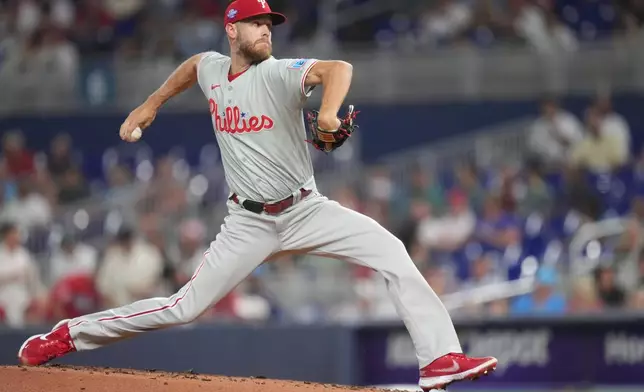 Philadelphia Phillies pitcher Zack Wheeler (45) throws against the Miami Marlins during the first inning of a baseball game, Friday, May 1, 2026, in Miami. (AP Photo/Jim Rassol)