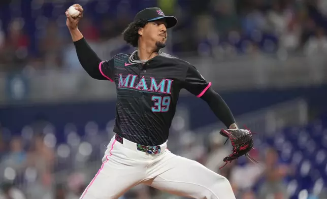 Miami Marlins pitcher Eury Pérez (39) throws against the Philadelphia Phillies during the first inning of a baseball game, Friday, May 1, 2026, in Miami. (AP Photo/Jim Rassol)