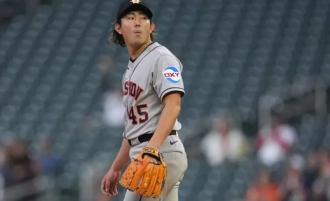 Houston Astros starting pitcher Tatsuya Imai stands on the mound as Minnesota Twins' Josh Bell runs the bases after hitting a solo home run during the second inning of a baseball game Monday, May 18, 2026, in Minneapolis. (AP Photo/Abbie Parr)