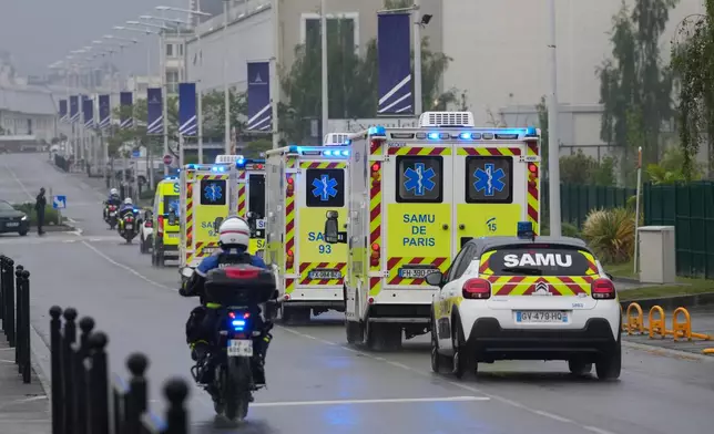 Ambulances carrying patients evacuated from the MV Hondius cruise ship with suspected hantavirus infection, leave the Bourget airport, north of Paris, Sunday, May 10, 2026. (AP Photo/Thibault Camus)