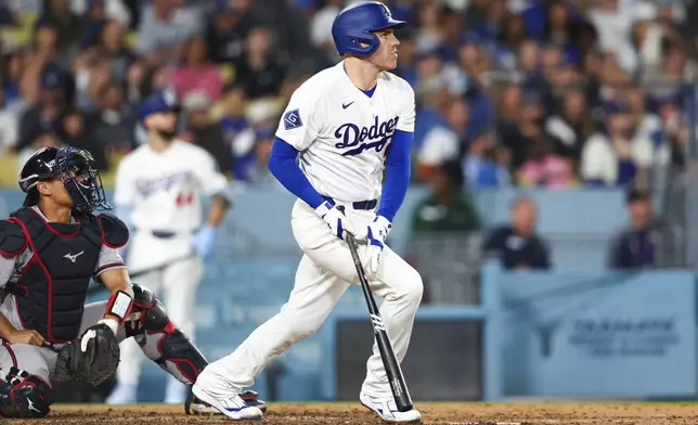 Los Angeles Dodgers' Freddie Freeman watches his home run during the sixth inning of a baseball game against the Atlanta Braves, Friday, May 8, 2026, in Los Angeles. (AP Photo/Jessie Alcheh)