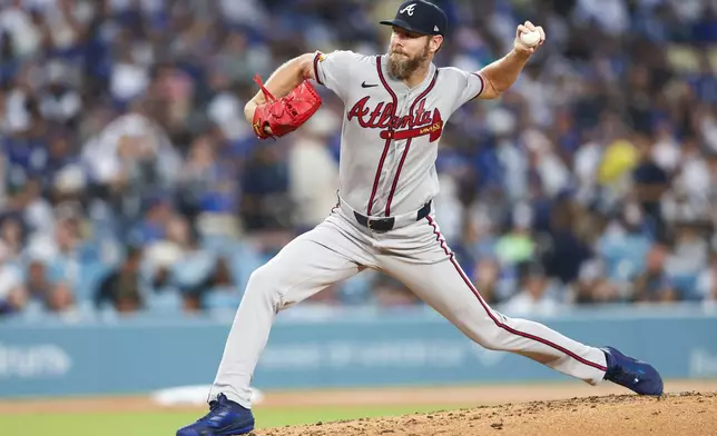 Atlanta Braves pitcher Chris Sale throws to a Los Angeles Dodgers batter during the second inning of a baseball game, Friday, May 8, 2026, in Los Angeles. (AP Photo/Jessie Alcheh)