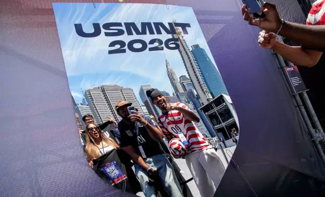 Fans arrive for the announcement of the United States men's national soccer team roster, Tuesday, May 26, 2026, in New York, ahead of the FIFA World Cup soccer tournament. (AP Photo/Eduardo Munoz Alvarez)