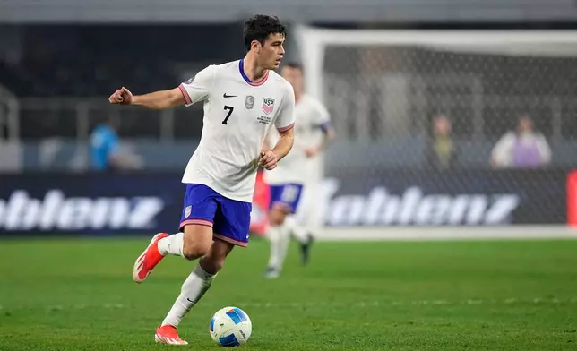 FILE - United States' Gio Reyna (7) controls the ball during a CONCACAF Nations League final soccer match against Mexico, Sunday, March 24, 2024, in Arlington, Texas. (AP Photo/Tony Gutierrez, File)