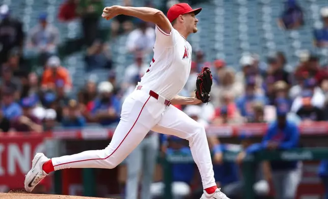 Los Angeles Angels pitcher Jack Kochanowicz throws to a New York Mets batter during the first inning of a baseball game, Sunday, May 3, 2026, in Anaheim, Calif. (AP Photo/Jessie Alcheh)