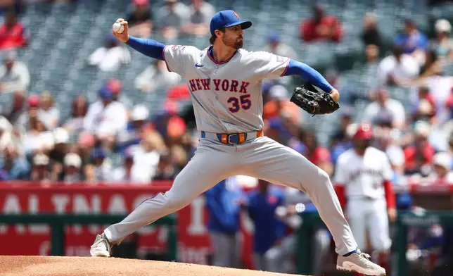 New York Mets pitcher Clay Holmes throws to a Los Angeles Angels batter during the first inning of a baseball game, Sunday, May 3, 2026, in Anaheim, Calif. (AP Photo/Jessie Alcheh)