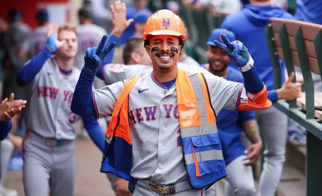 New York Mets' Mark Vientos gestures in the dugout after hitting a home run during the fourth inning of a baseball game against the Los Angeles Angels, Sunday, May 3, 2026, in Anaheim, Calif. (AP Photo/Jessie Alcheh)