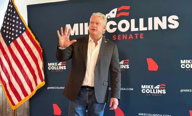 U.S. Rep. Mike Collins, R-Ga., speaks to supporters in Acworth, Ga., on Monday, May 4, 2026. (AP Photo/Jeff Amy)