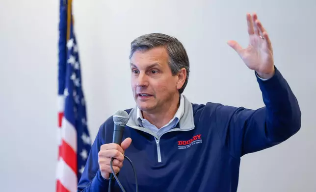 Republican U.S. Senate candidate Derek Dooley speaks at a campaign stop at Farmview Market in Madison, Ga., on May 8, 2026. (Arvin Temkar/Atlanta Journal-Constitution via AP)