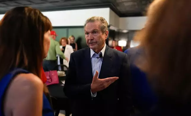 Republican gubernatorial candidate Rick Jackson speaks to voters during a campaign stop, Wednesday, May 13, 2026, in Hiram, Ga. (AP Photo/Mike Stewart)