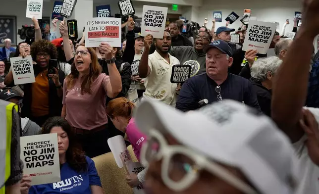 Protesters shut down a Senate committee meeting during a special session of the state legislature to redraw U.S. Congressional voting maps Wednesday, May 6, 2026, in Nashville, Tenn. (AP Photo/George Walker IV)