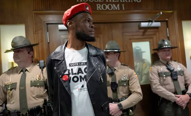 Deonte Williams stands outside a House committee hearing room after it was cleared by state trooper during a special session of the state legislature to redraw U.S. Congressional voting maps Wednesday, May 6, 2026, in Nashville, Tenn. (AP Photo/George Walker IV)