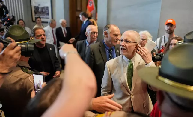 Sen. Brent Taylor, R-Memphis, taunts protesters as he leaves the Senate chamber after a special session of the state legislature to redraw U.S. Congressional voting maps, in Nashville, Tenn., Tuesday, May 5, 2026. (AP Photo/George Walker IV)