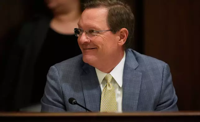 House Speaker Cameron Sexton, R-Crossville, smiles after a House committee meeting during a special session of the state legislature to redraw U.S. Congressional voting maps Wednesday, May 6, 2026, in Nashville, Tenn. (AP Photo/George Walker IV)